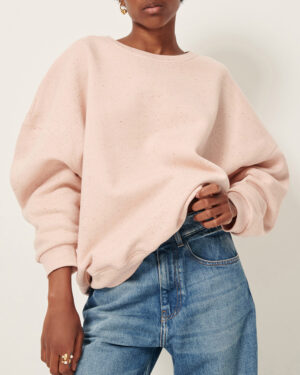 Pull oversize femme en molleton chiné boutonné, fabriqué au Portugal. 74% coton biologique certifié OCS, 13% polyester recyclé certifié RCS, 8% modal, 5% lin. Référence CHEBBI Ballerina Sessùn. rose clair, rose poudré clair